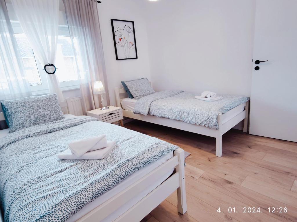 Second bedroom with two single beds